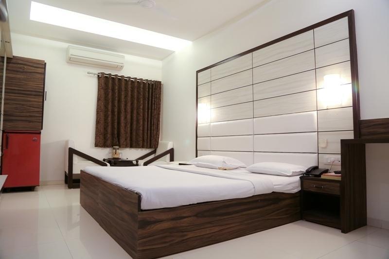 Golden Plaza Hotell Ahmedabad Rom bilde