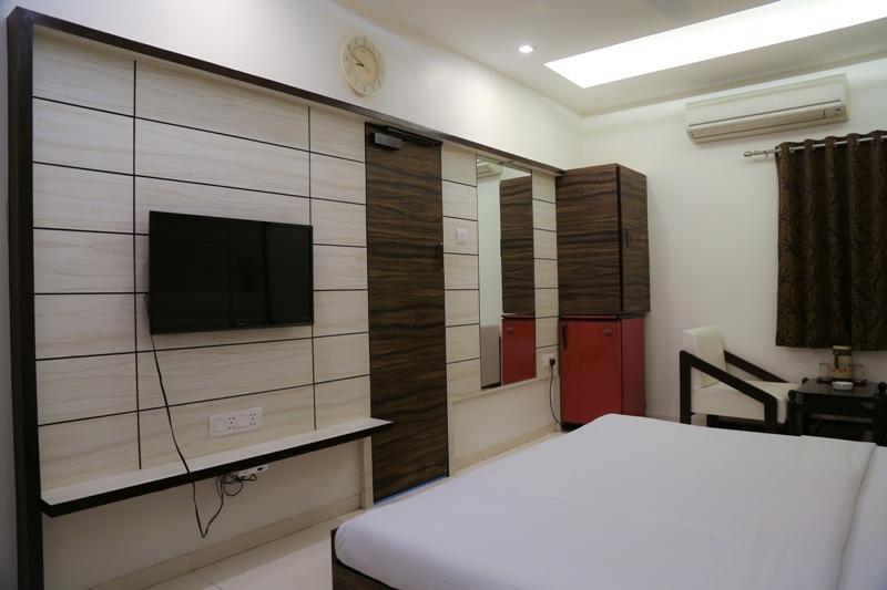 Golden Plaza Hotell Ahmedabad Rom bilde