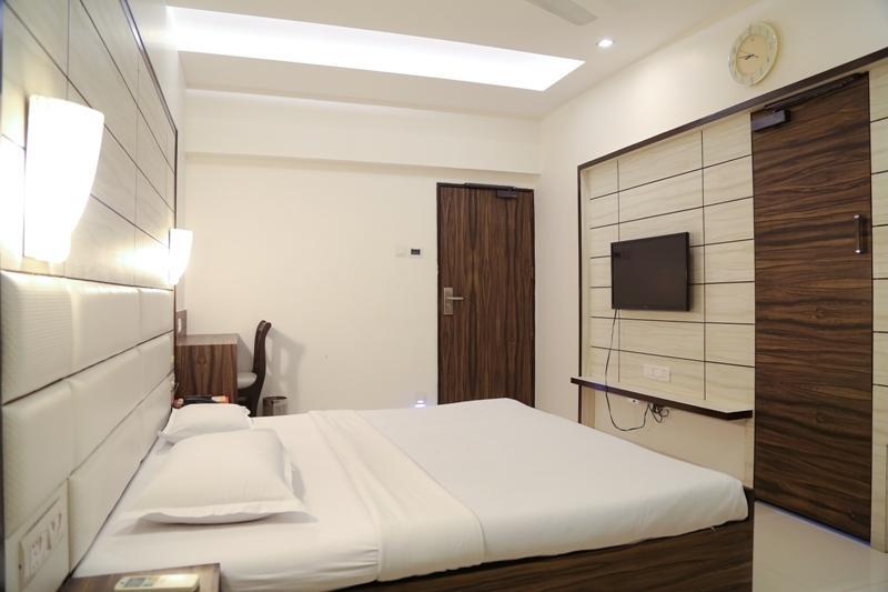 Golden Plaza Hotell Ahmedabad Rom bilde